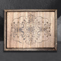 Geometric Floral by CamiThunderInk, an original pyrography piece of a symmetrical flower mandala burned across a slatted reclaimed pine panel in a weathered wood frame