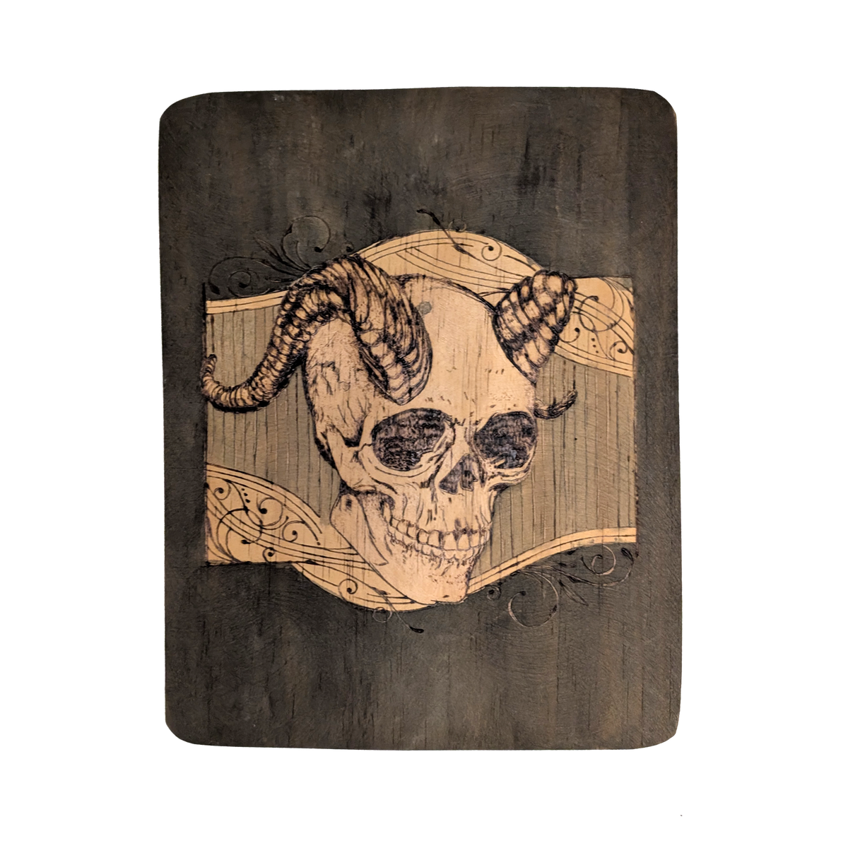 Another view of Cerebral Cernunnos by CamiThunderInk, an original pyrography piece on a rustic reclaimed wood slab showing a horned skull against a heavily textured burned background