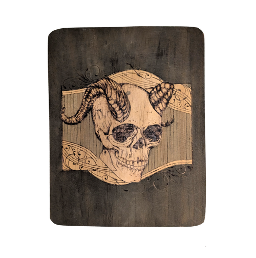 Another view of Cerebral Cernunnos by CamiThunderInk, an original pyrography piece on a rustic reclaimed wood slab showing a horned skull against a heavily textured burned background