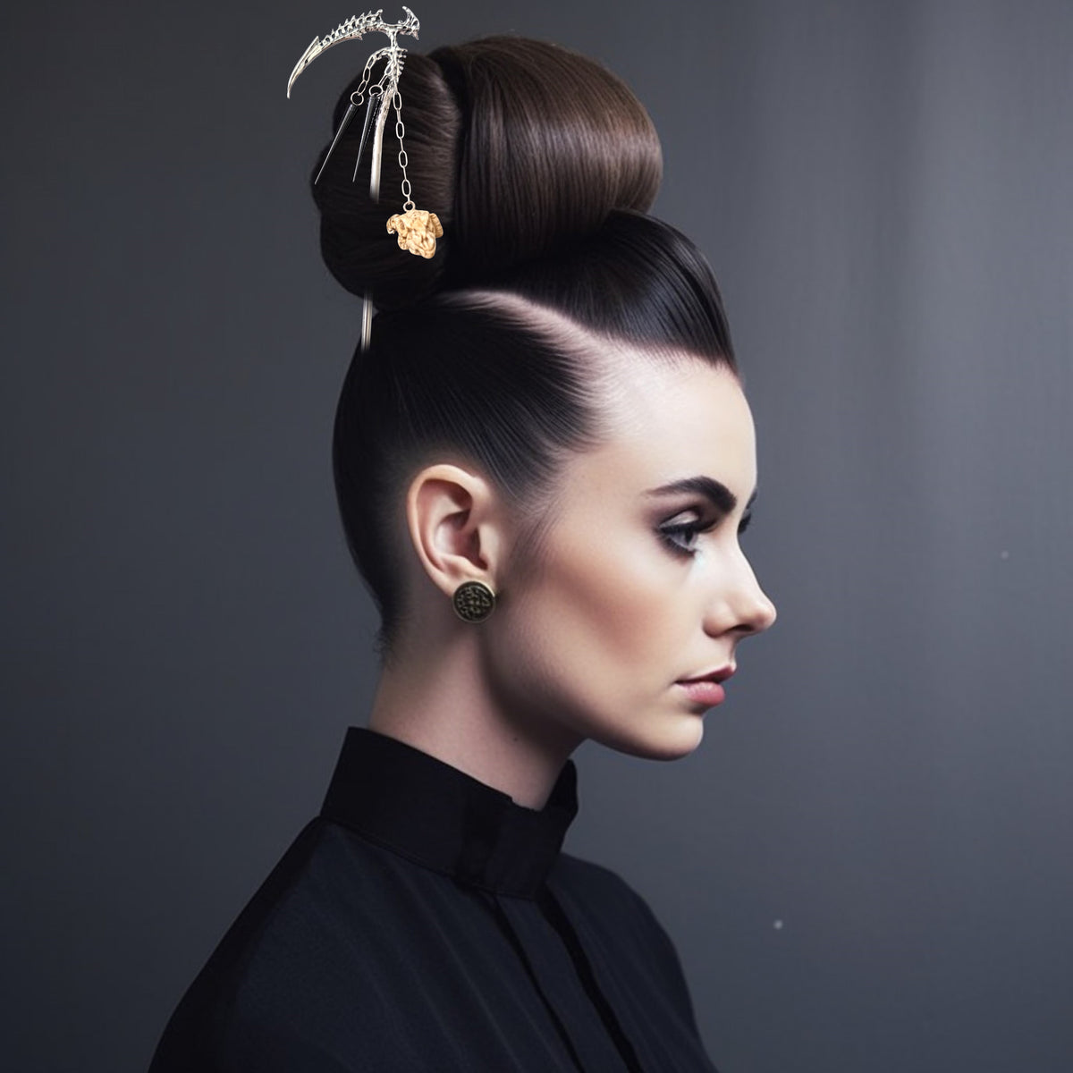 Side profile of a model with dark hair styled in a high bun secured by the silver spine-scythe hair pick, with the ram skull charm hanging low against the hair.