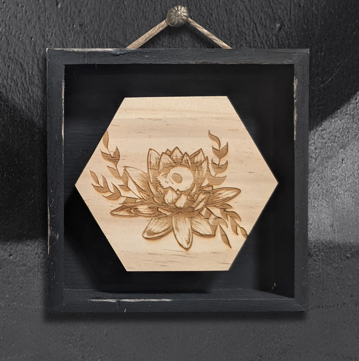 Skully Flowers Lotus miniature framed piece by CamiThunderInk, a laser etched wood lotus with a skull at its center, in a small 4x4 frame