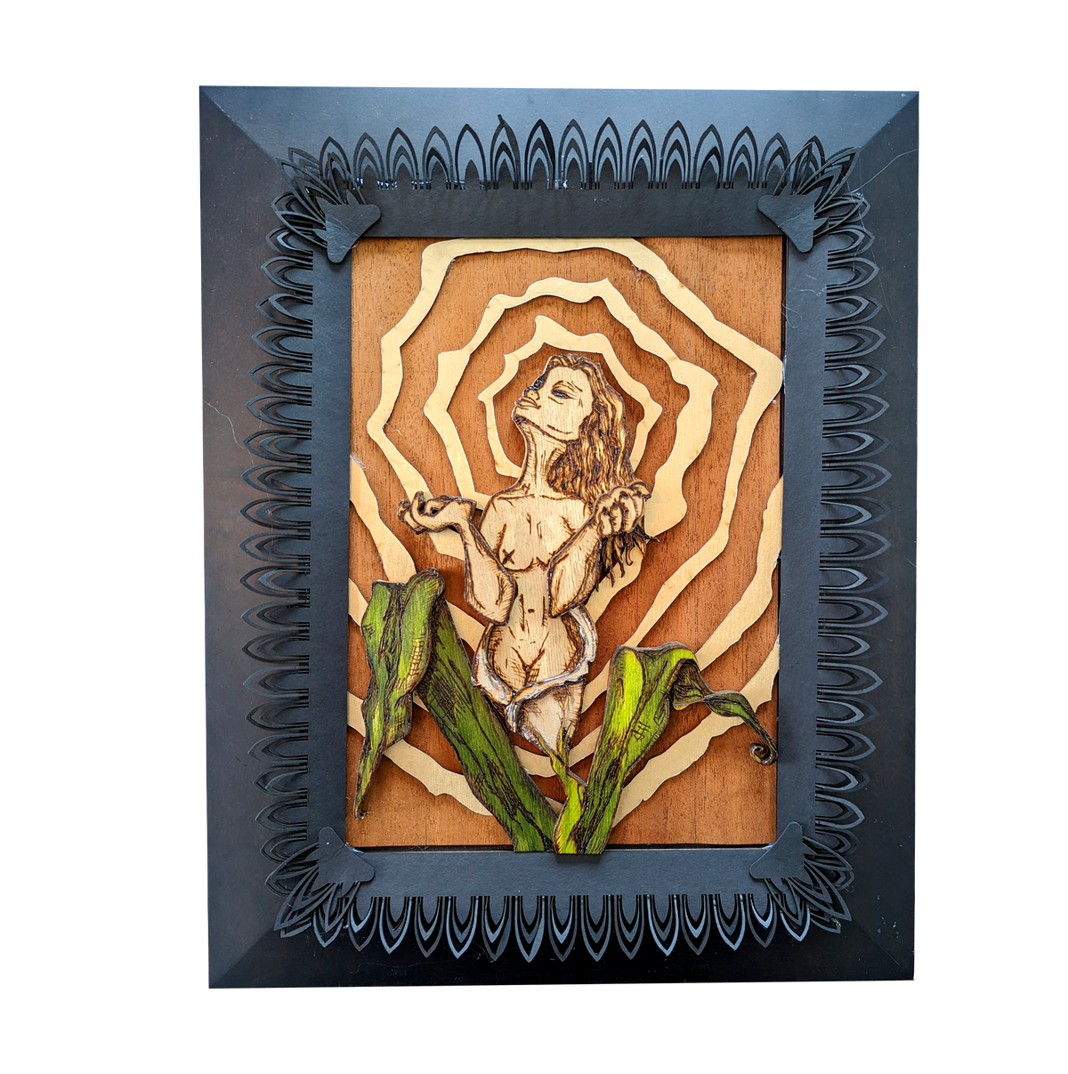Another view of Birth of a Calla Lily by CamiThunderInk, an original layered relief artwork of a woman burned and watercolored on laser cut birch, surrounded by gold rays and mounted on a recycled cabinet door with a black border