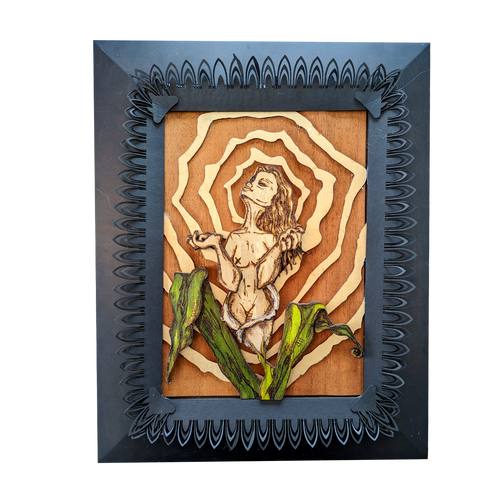 Another view of Birth of a Calla Lily by CamiThunderInk, an original layered relief artwork of a woman burned and watercolored on laser cut birch, surrounded by gold rays and mounted on a recycled cabinet door with a black border