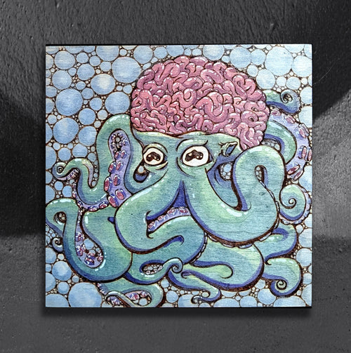 Bubbles and Brains by CamiThunderInk, an original pyrography, watercolor, and ink painting on wood of a blue and purple octopus with a brain for a head, surrounded by bubbles