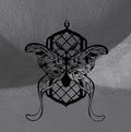 Floral Moth wall hanger by CamiThunderInk, a matte black 3D printed moth with lattice body panels, floral wings, and curled feet