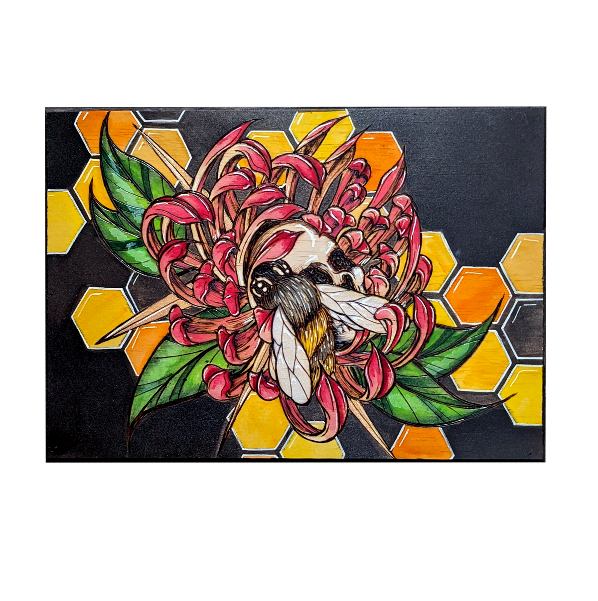 Another view of Sweet Nectar Repose by CamiThunderInk, an original pyrography, watercolor, and acrylic painting on a thick wood panel showing a large bee resting on a skull beside a yellow and pink chrysanthemum, over a honeycomb pattern