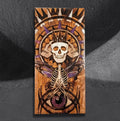 Crowned Triple Skeleton by CamiThunderInk, an early pyrography, watercolor, and resin piece on scrap wood showing a crowned triple skull in a spiked halo, a moth with a ribcage body, and an eye below, in purple and warm wood tones