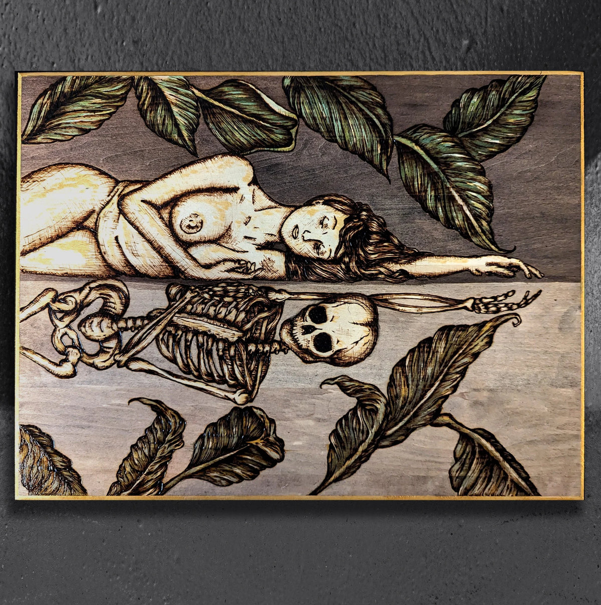 Another view of Vainglorious Contrition by CamiThunderInk, an original pyrography and dark ink wash painting on wood of a mourning skull